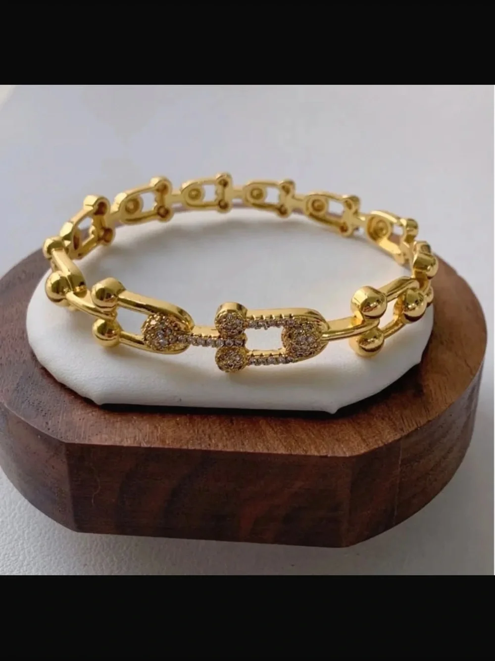 Goldtone bracelet.